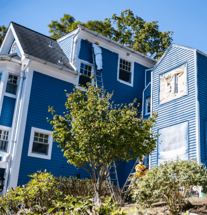 blue home after exterior painting